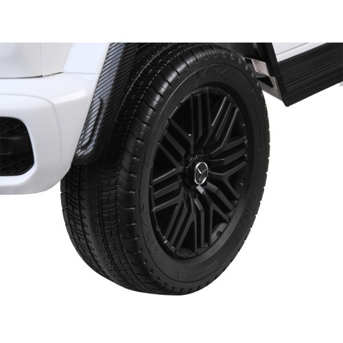 Автомобіль на акумуляторі Мерседес G клас 63 AMG 4x4 Панель Радіо 2 людини PA0309 фото 9